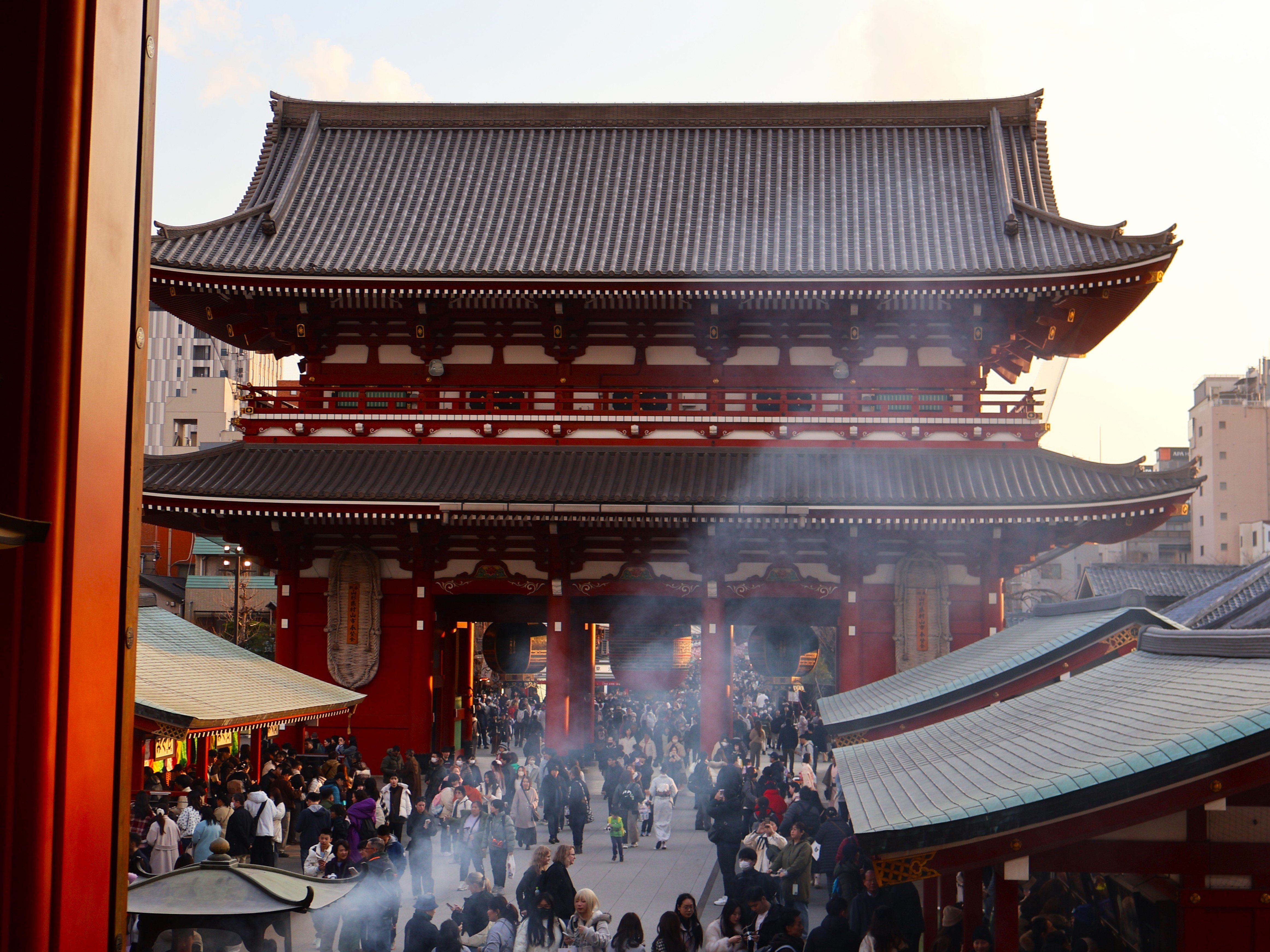 Shinto temple in Tokyo with smoke in front of it